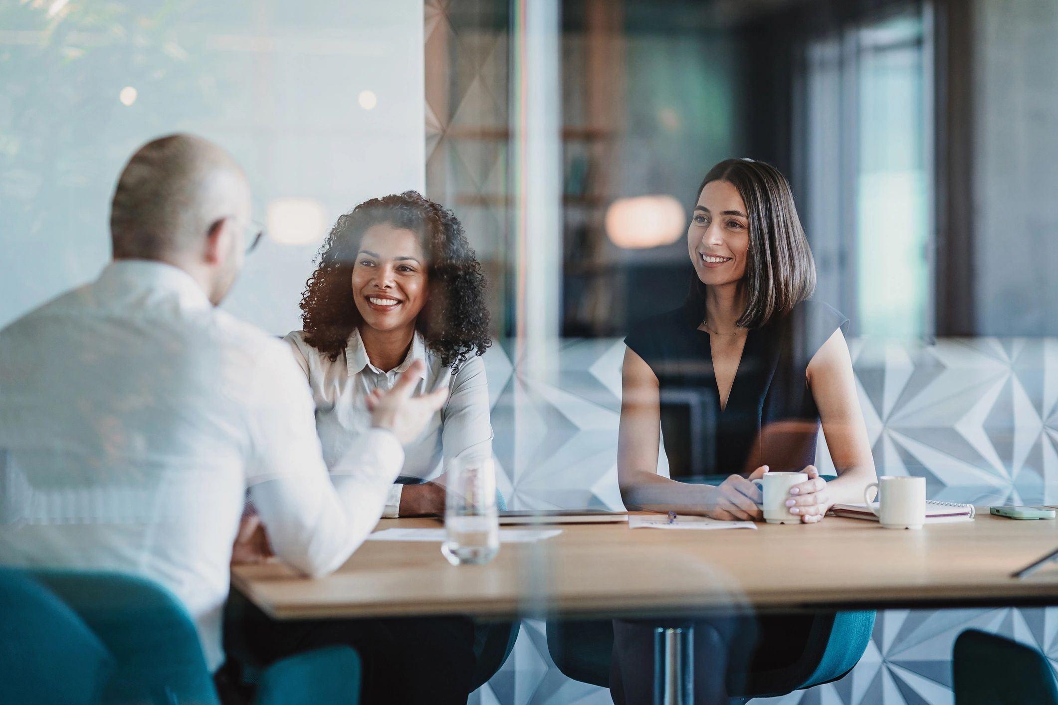 Advisors in a meeting discussing business finances